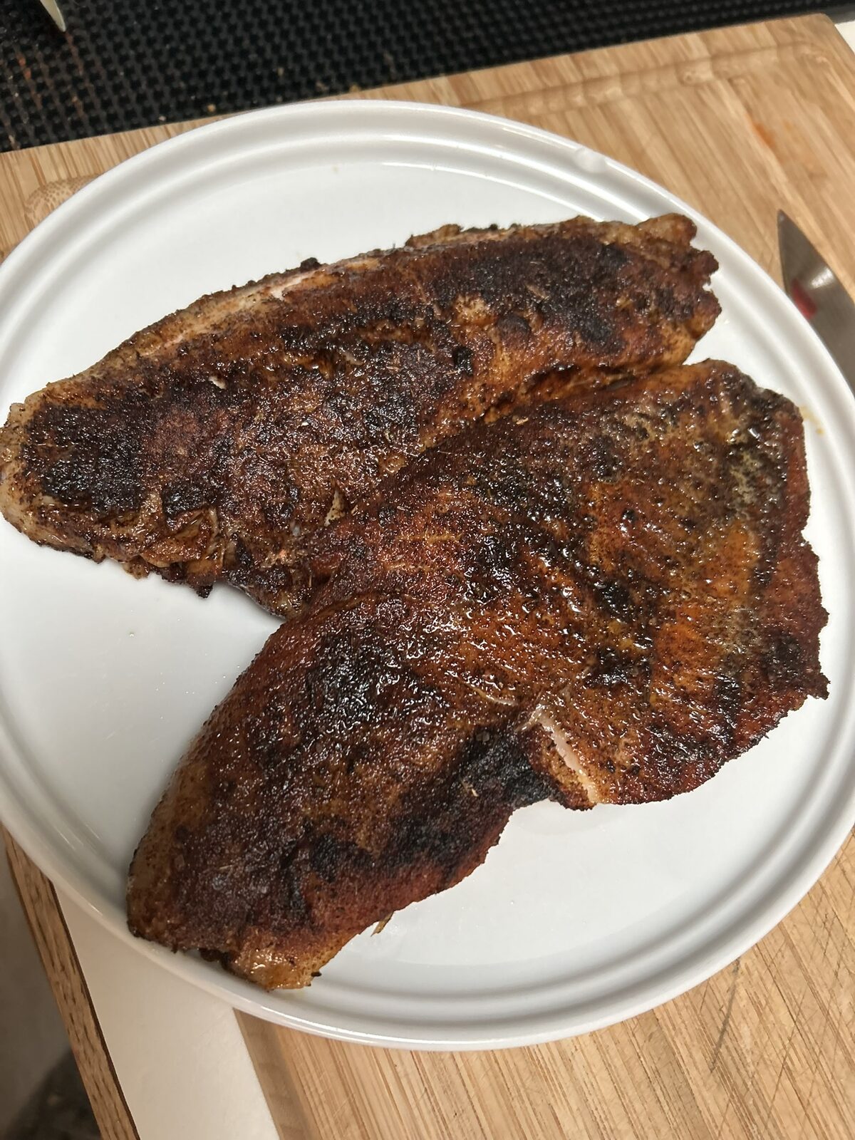 Blackened Rockfish fillets on a plate