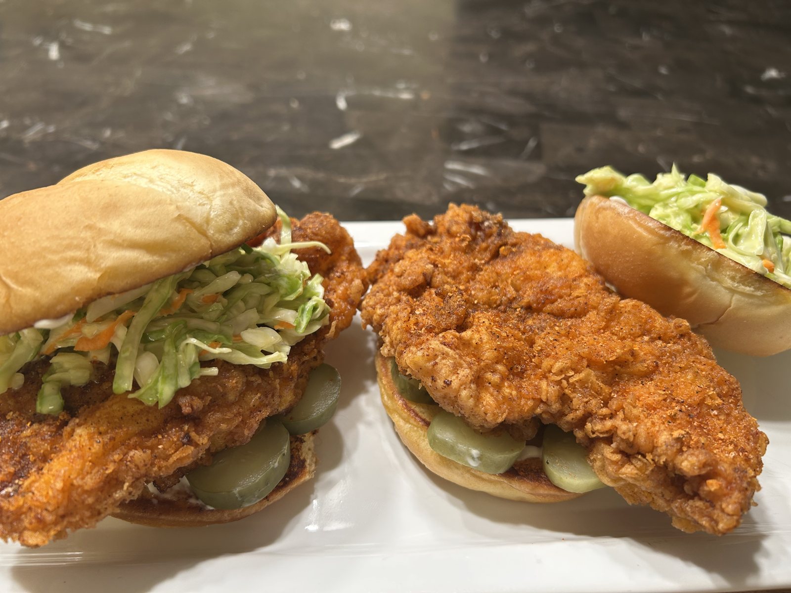 Nashville hot fried chicken sandwiches served with slaw