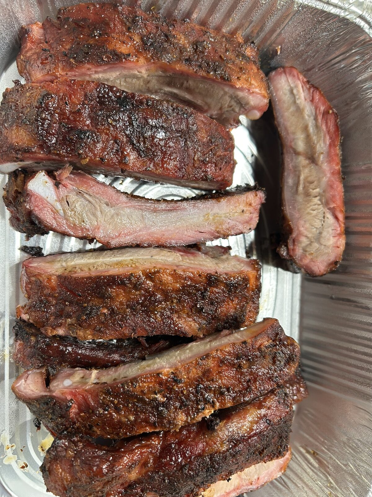 Finished St. Louis ribs sliced and ready to serve